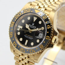 Rolex GMT-Master II 18K yellow gold watch featuring a black dial and a Jubilee bracelet  126718GRNR-0001