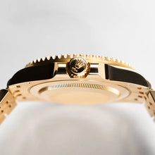Rolex GMT-Master II 18K yellow gold watch featuring a black dial and a Jubilee bracelet  126718GRNR-0001